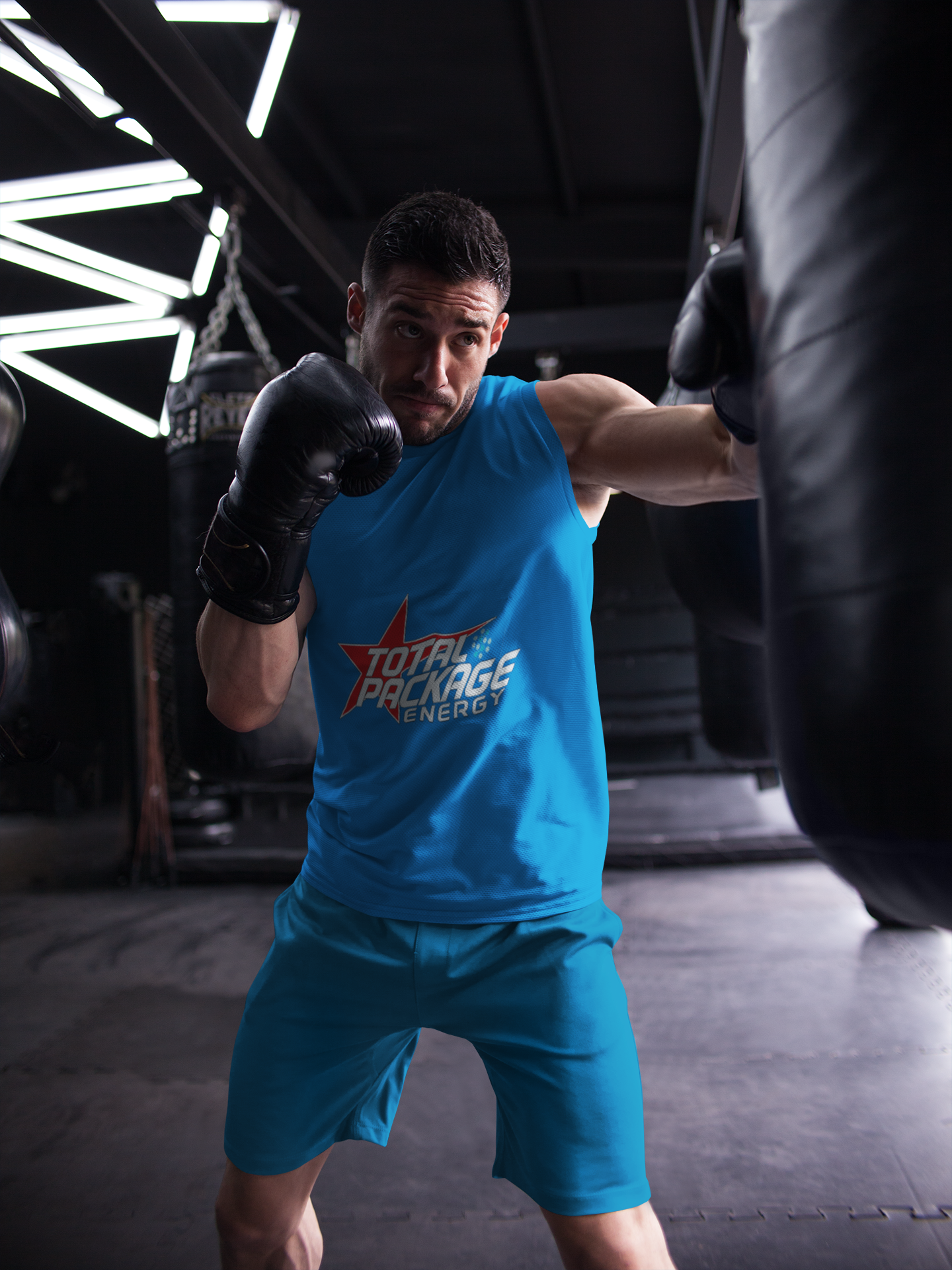 mockup-of-a-man-hitting-the-bag-while-wearing-custom-sportswear-a16803 mockup-of-a-man-hitting-the-bag-while-wearing-custom-sportswear-a16803